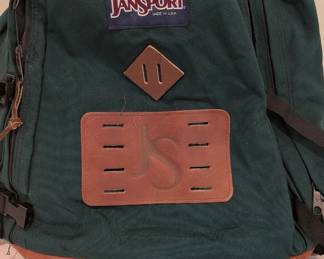 This is a classic Vintage 90s JanSport "Made in USA" backpack, and it’s a great find for an estate sale. Collectors specifically look for the "Made in USA" tag and the suede/leather bottom, which are hallmarks of the brand's more durable era.