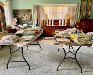 Linens and furniture in master bedroom 