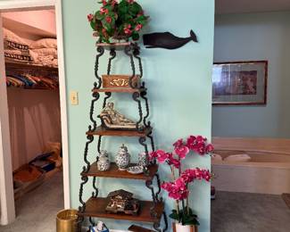 Corner etagere in the master bath