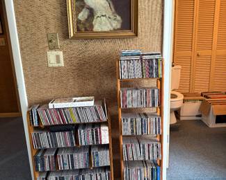 CDs, vintage reproduction Renoir Woman at the Piano.