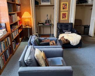Office with chairs, desk, books, art, LPs etc