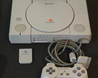 Sony PlayStation Console with Controller and Memory Card
