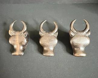 Set of Carved Wooden Bull Head Figurines