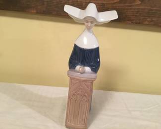 Lladro kneeling nun