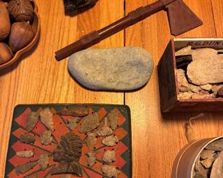 at bottom of basement stairs. pipe in showcase