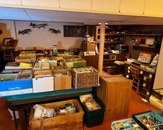 view of basement to the right of basement stairs then another right 