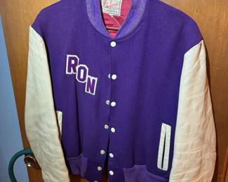 first floor down hallway bedroom at the end of the hall on left