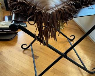 Leather and iron fireside stool and leather fringe pillow
