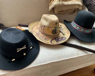 Unique men’s hats including custom Charlie 1 Horse (on right)