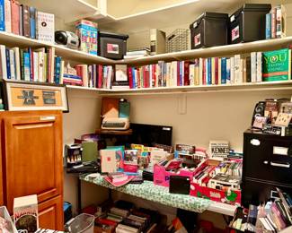 Office full of books, CDs, and DVDs.