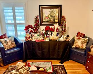 Christmas decor, leather barrel chairs.