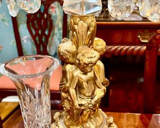 Hollywood Regency mixed in with large candelabra.