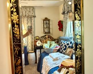 Vintage LaBarge black and gold crane mirror.