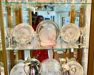 Full of Haviland Limoges "Rosalinde", etched crystal stemware, and silver.