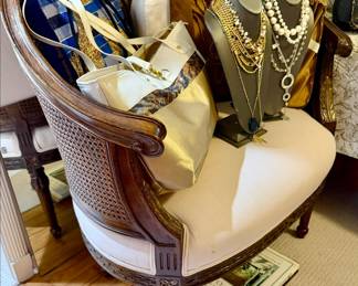 Lovely Double Caned Chair. Costume Jewelry.
