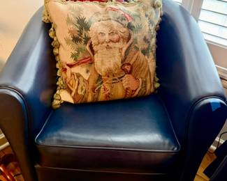 Pair of barrel leather chairs.