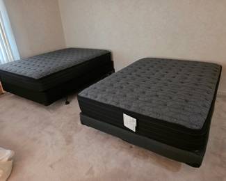 Two very nice Full size mattress and box spring sets. 