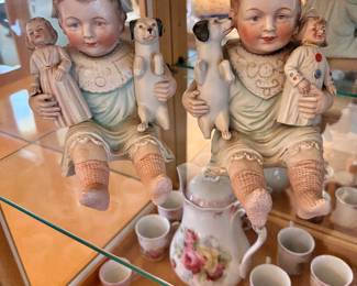 Porcelain German piano dolls