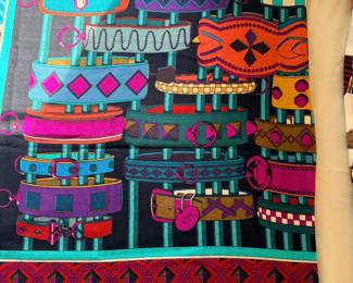 Luxury scarf from the iconic French fashion house Hermès. The design is titled "Colliers de Chiens" (Dog Collars), created by artist Virginie Jamin and first issued in 2013. It is part of Hermès' long-standing tradition of celebrating equestrian and lifestyle objects, in this case, a whimsical display of ornamental dog collars.