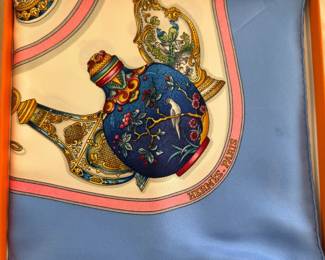 Hermès silk scarf in the design titled "Qu'Importe le Flacon" (translated as "No matter the bottle")