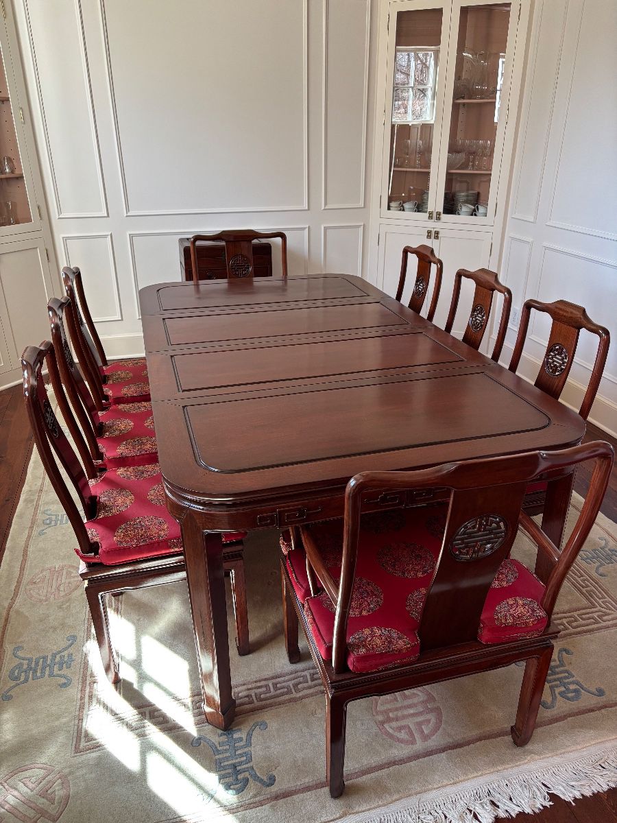 Rosewood dining table and 8 chairs 