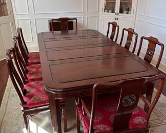 Rosewood dining table and 8 chairs 