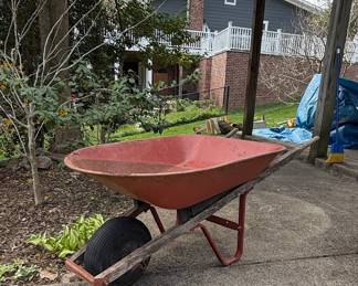 Vintage Red Metal Wheelbarrow with Wooden Handles