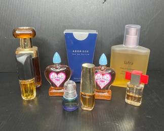 Assorted Vintage Perfume Bottles including Blue Waltz, Adorisse, and Jafra