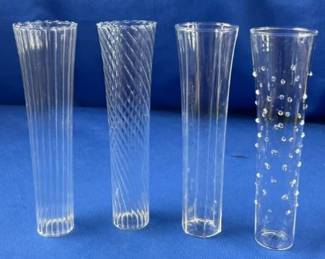 Four Clear Glass Stemless Champagne Flutes With Varied Designs