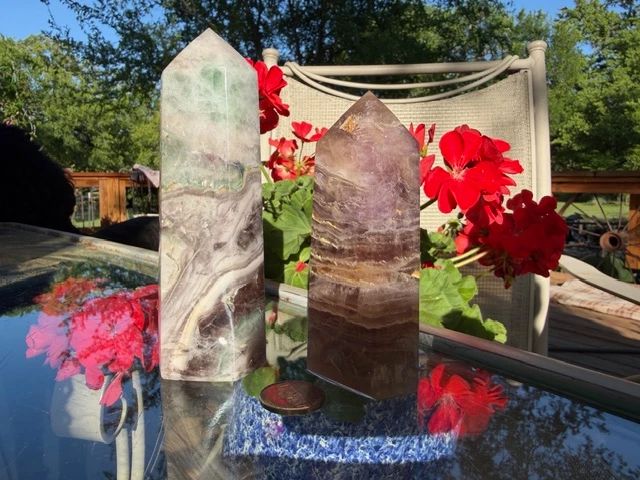 We have a beautiful collection of Chrystal Towers and Points! Here we have a pair of banded fluorite.