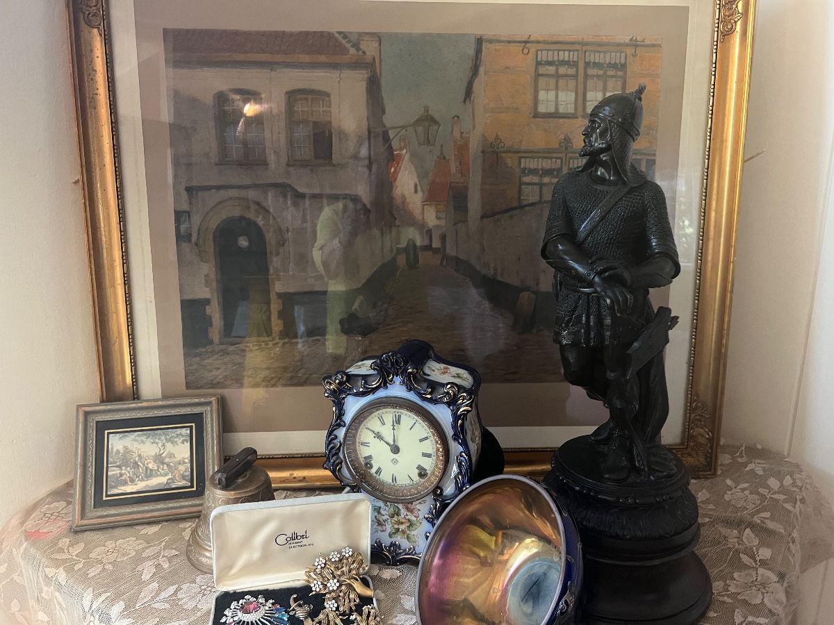 Large Lithograph, Antique Ansonia Clock, beautiful Rockwell Sterling inlaid bowl, Joseph of Hollywood Vintage pins, Large Statute, 1878 Bronze Bell