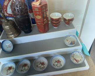 Japanese Tibetan ritual bell 19thC Ghanta Buddhist Chinese Buddha Buffalo Horn..Kutani Whistling sake set...WWI &WW11 Japanese military saki cups (bottom)