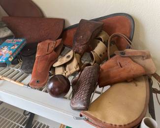 Collection of leather gun holders(sorry no guns)