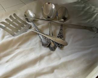 Sterling Silver...there is also a sterling silver serving set