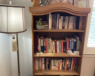 In This Picture: Floor Lamp, Bookshelf, Books & Various Decor