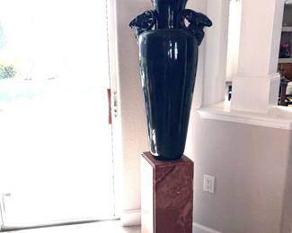 Goat, head vase on marble stand