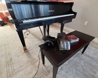 Baby grand player piano needs work sold as is