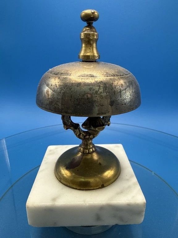 Antique hotel concierge bell.