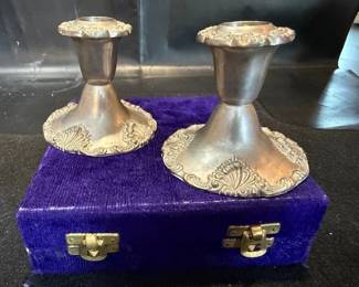 Pewter candlesticks.