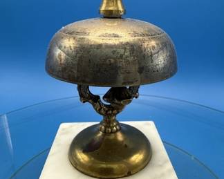 Antique hotel concierge bell.