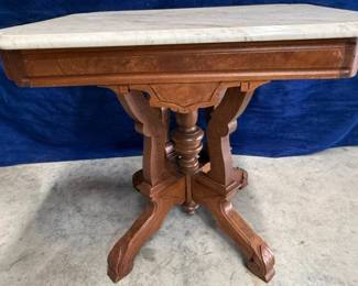 East Lake walnut / mahogany marble top table.