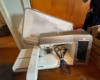 Baby Lock embroidery machine, with all the supplies, CDs, books