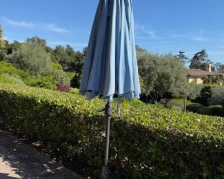 Umbrella on Iron Rolling Stand