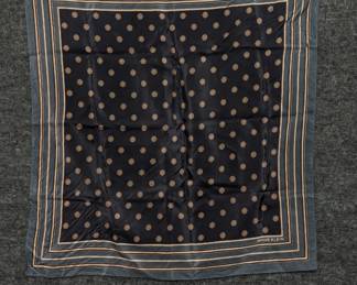 Anne Klein silk square scarf featuring a black and gold floral pattern with a bordered design