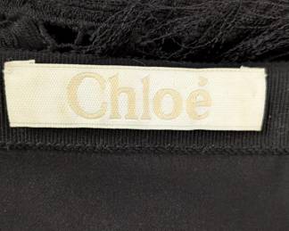 Tag inside the Chloé drop waist black geometric lace tank dress
