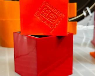 Closeup of vintage mid-century plastic serving ware, dish ware, and other items including pieces by Danese Milano (Italy), Gustavsberg (Sweden), Florineige, Heller, Dansk, and Fiskars Finland 