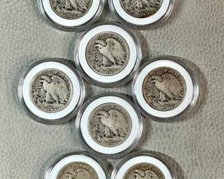Reverse of the Eight (8) Walking Liberty Silver Half Dollars of mixed dates