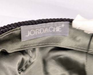 Closeup of the Jordache black corduroy flat cap or ascot cap