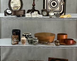 An antique Charles G. Bush parlor kaleidoscope on wooden stand, a circa 1967 set of David Doty DotyBlocks, a selection of antique and vintage pocket watches and desk clocks, an antique drafting instrument set featuring various compasses, ruling pens, and dividers for technical drawing, housed within a wooden case lined with blue velvet; and an antique Chinese Mahjong set circa 1923 with tiles, betting sticks, and dice in a dark wood cabinet or drawered chest which includes a sliding front panel and brass handles.