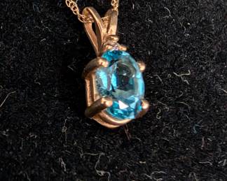 10k yellow gold and blue topaz pendant necklace